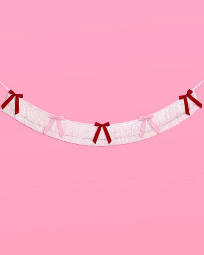 White Iridescent Fringe Garland with Red and Pink Velvet Bows