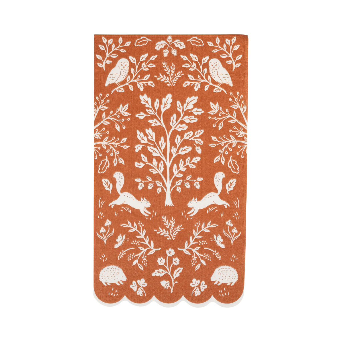 Rust-colored paper dinner napkin with white forest woodland pattern.