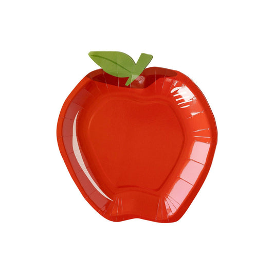 Red apple-shaped plate with a green leaf on a white background
