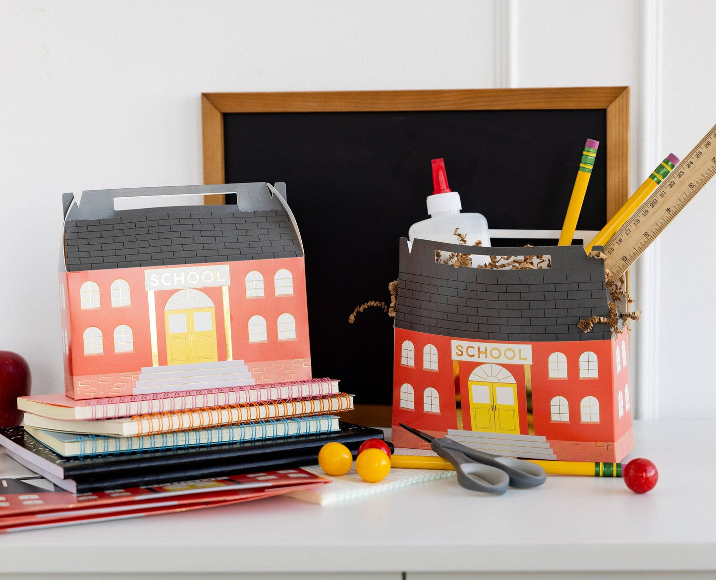 School-themed party favor set with school supply goodies inside.