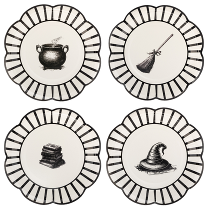 Four round decorative plates, each with a scalloped edge, black-and-white striped border, and a black witch-themed illustration in the center: a cauldron, broom, stack of books, and witch hat.
