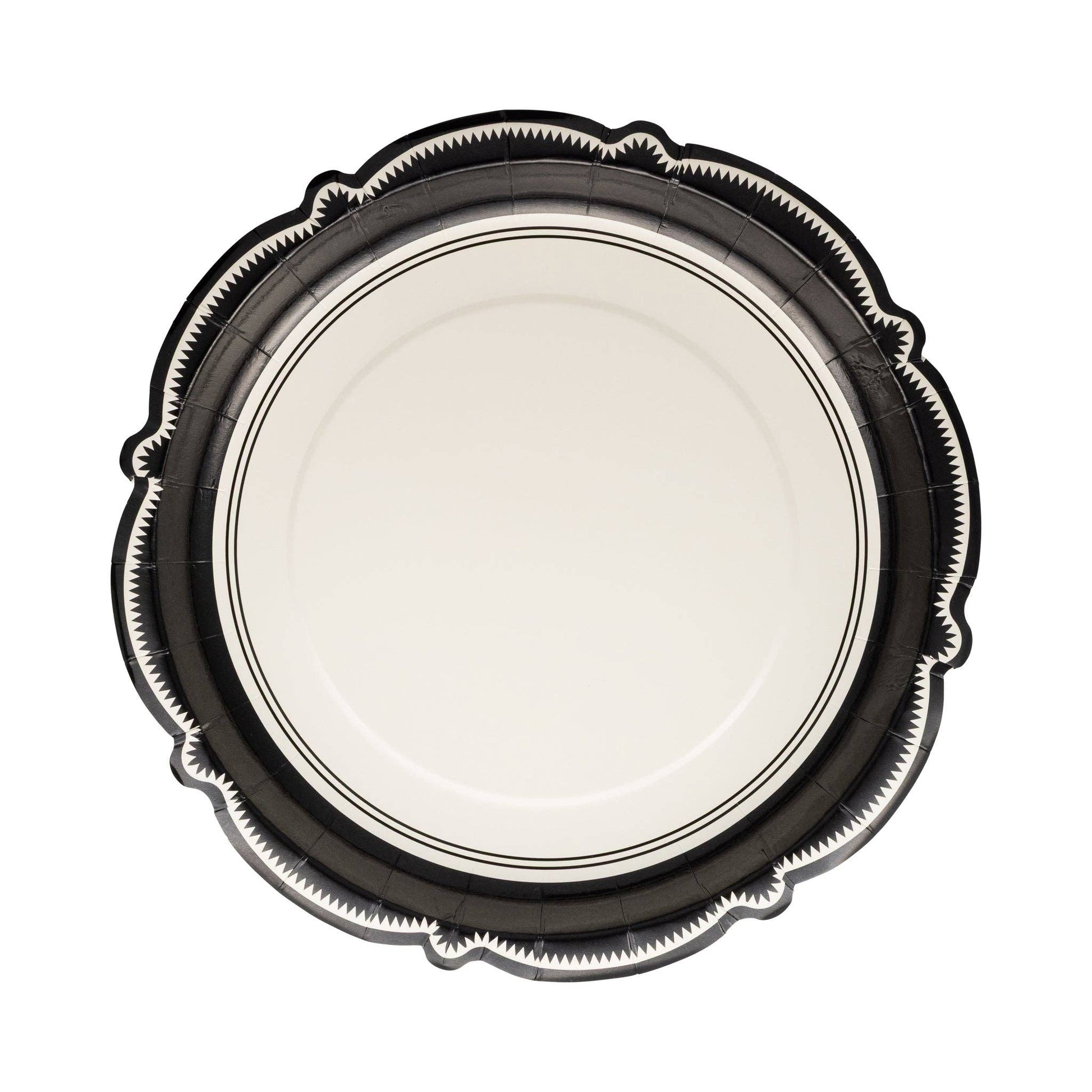 White decorative paper plate with intricate black bracket border.