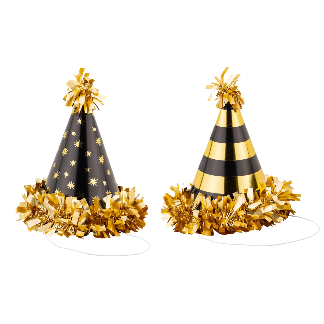 Two black and gold party hats with gold fringe.