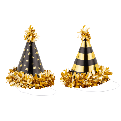 Two black and gold party hats with gold fringe.