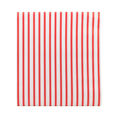 Red and white striped paper table runner on a white background.