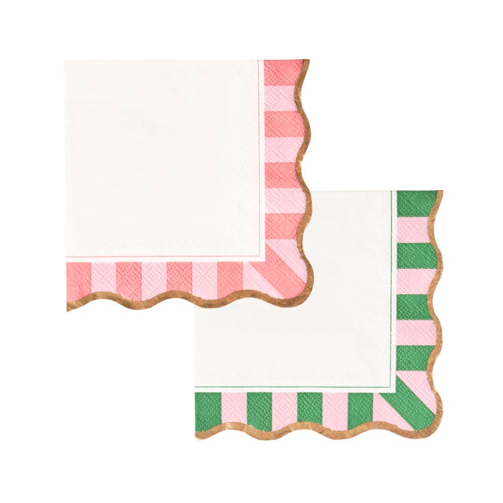 A pair of assorted cocktail napkins with a pink and green cabana striped border on a white background