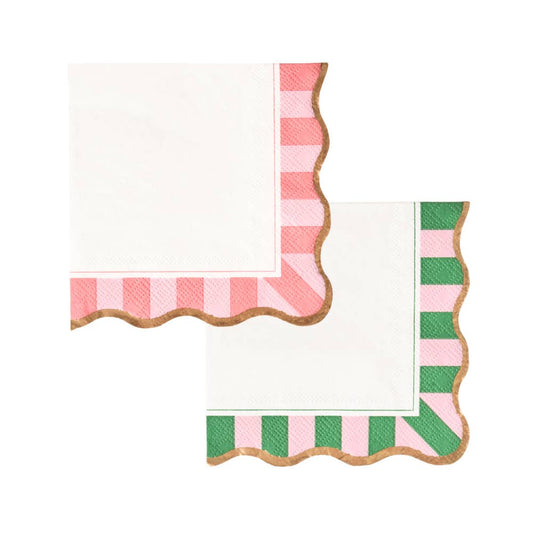 A pair of assorted cocktail napkins with a pink and green cabana striped border on a white background