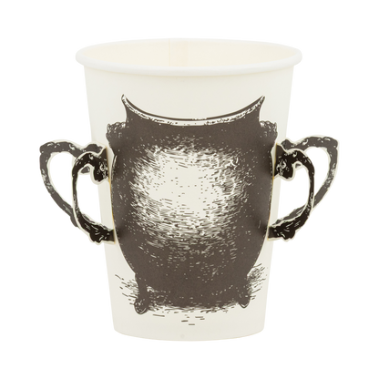 White paper cup with black witches' cauldron design on a white background