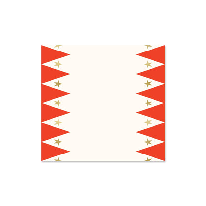 Paper table runner with a carnival print, featuring gold foil stars, in red and white colors.