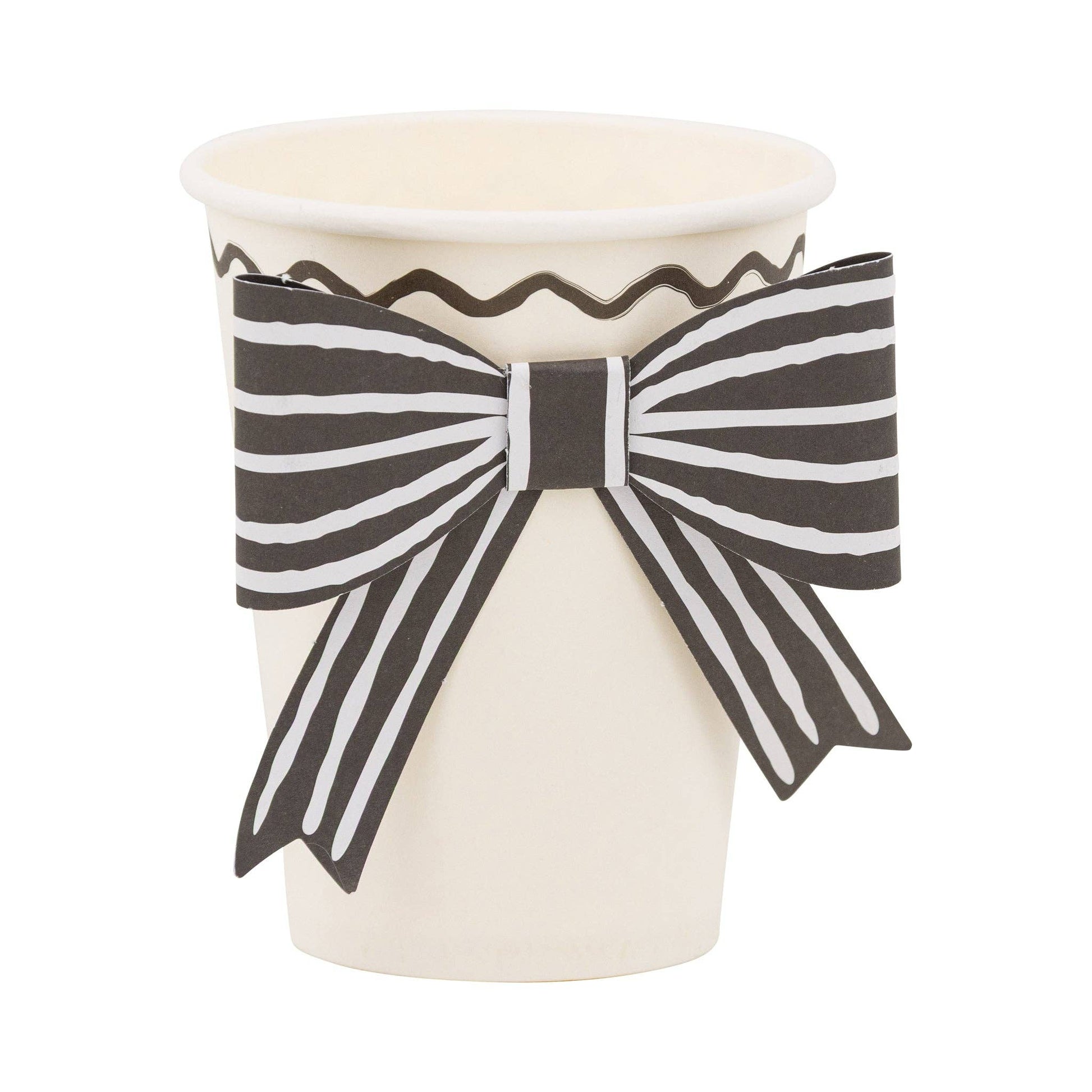 Cream cup with a black and white striped bow on a white background.