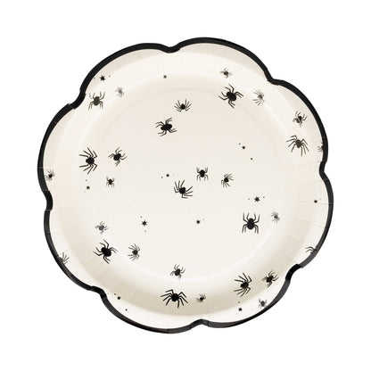 Decorative white paper plate with black spider design and black trim.