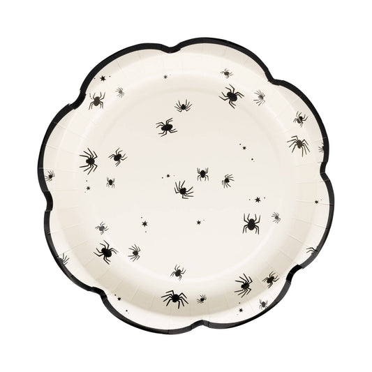 Decorative white paper plate with black spider design and black trim.
