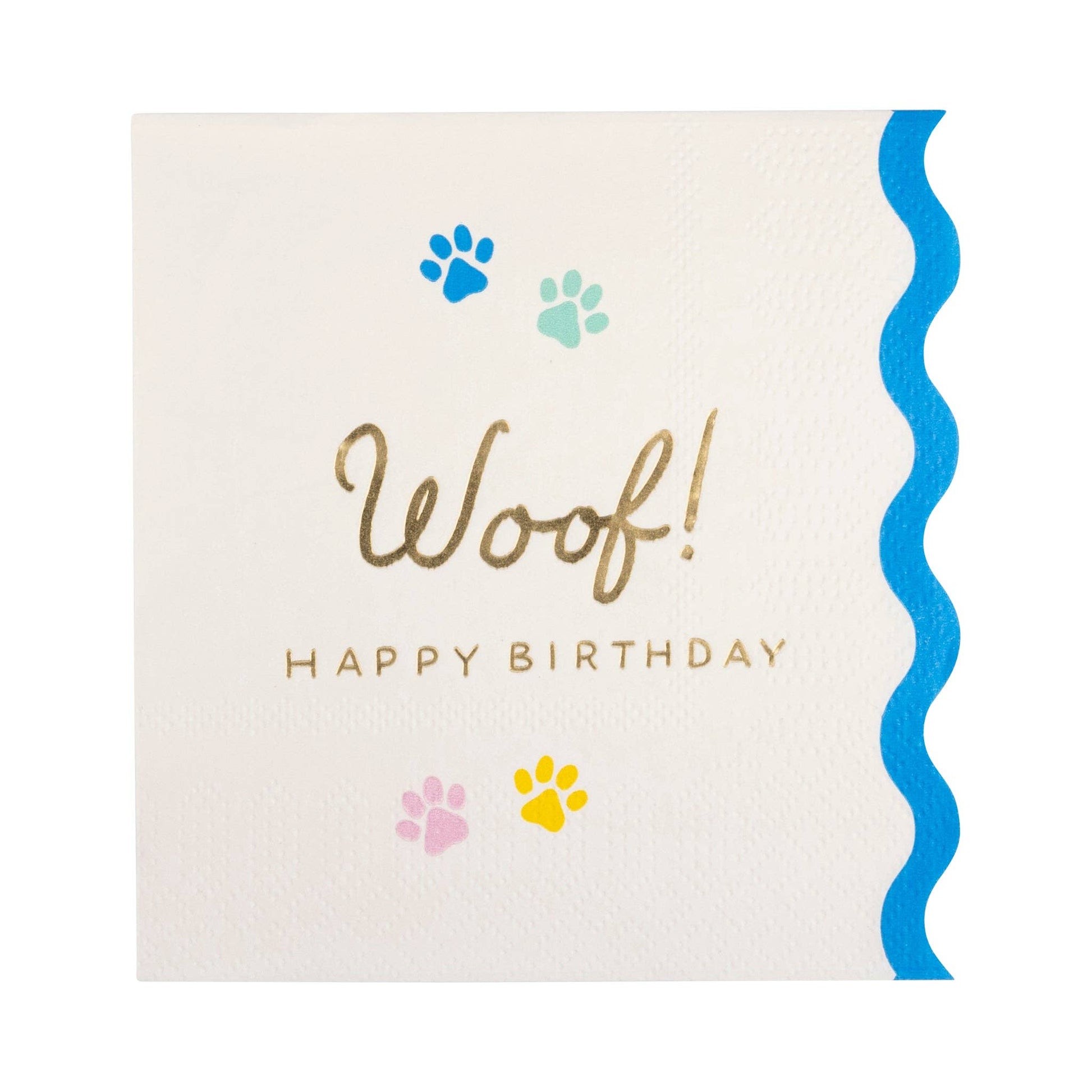 Cocktail napkin with 'Woof! Happy Birthday' text and paw print design and wavy blue edge trim.