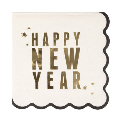 Napkin with 'Happy New Year' text in gold on a white background.