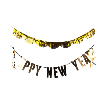 Gold and black 'Happy New Year' banner set with scalloped fringe on a white background.
