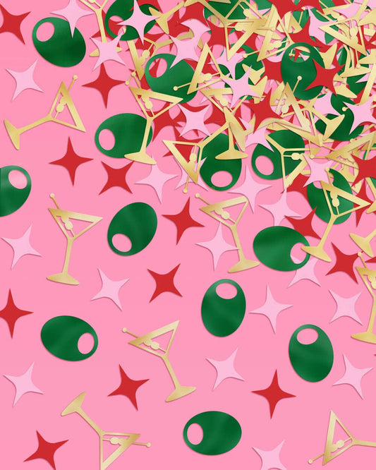Confetti featuring a mix of green martini glasses, red stars, and gold triangles on a pink background.