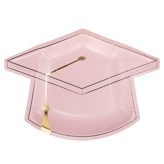 Pink graduation cap shaped plate with gold tassel on a white background