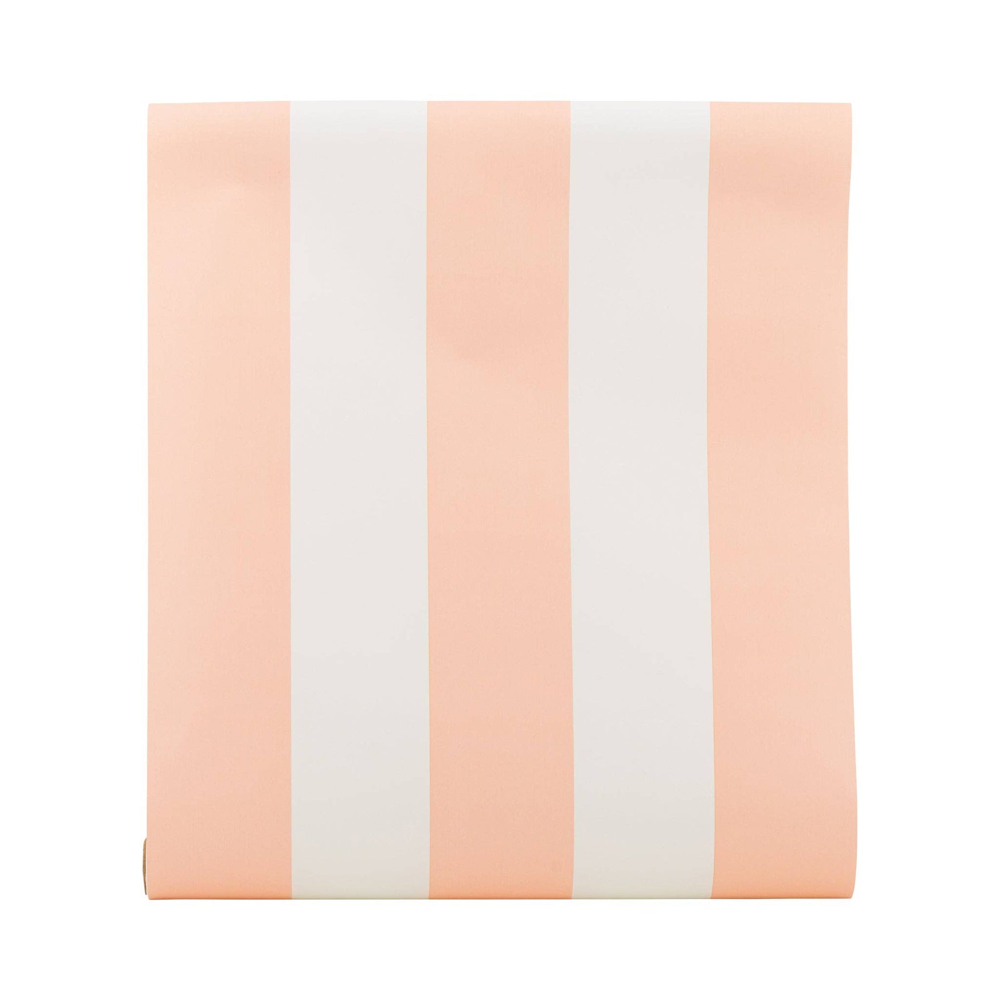 Paper table runner on a roll with pink and white vertical stripes on a white background.