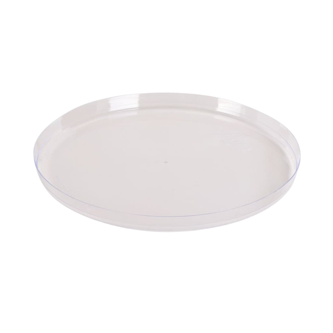 A clear, shallow round plastic plate, shown from a top-down angle on a solid white background.