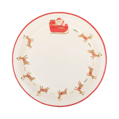 Round plate with Santa and reindeer design with red trim on a white background.