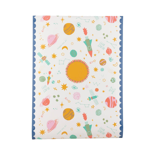 Paper table runner with space-themed illustrations on a white background