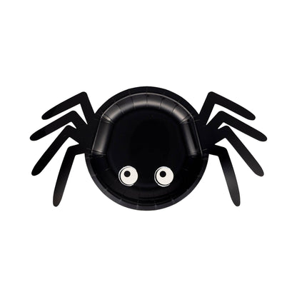 Black spider-shaped paper plate with googly eyes.