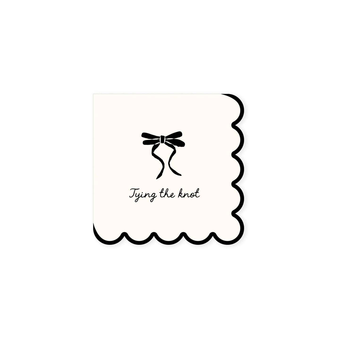 White scalloped cocktail napkin with a black bow design and text 'Tying the knot' on a white background.