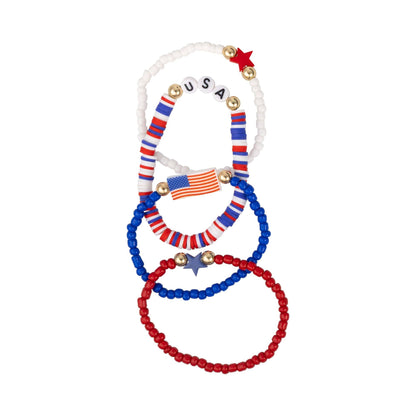Set of four beaded bracelets with American flag and star designs on a white background