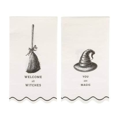 Two decorative guest towel napkins with witch-themed graphics and text on a white background