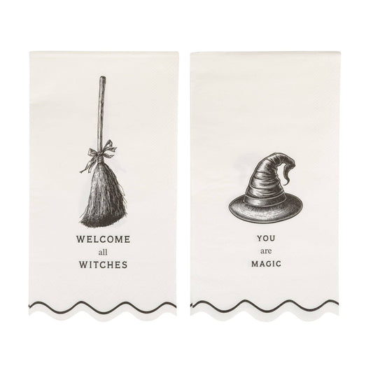 Two decorative guest towel napkins with witch-themed graphics and text on a white background