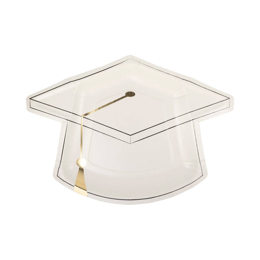 White graduation cap shaped plate with gold accents on a white background