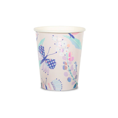 A paper cup with a pastel palette and holographic silver foil-pressed elements, featuring butterfly and floral designs.