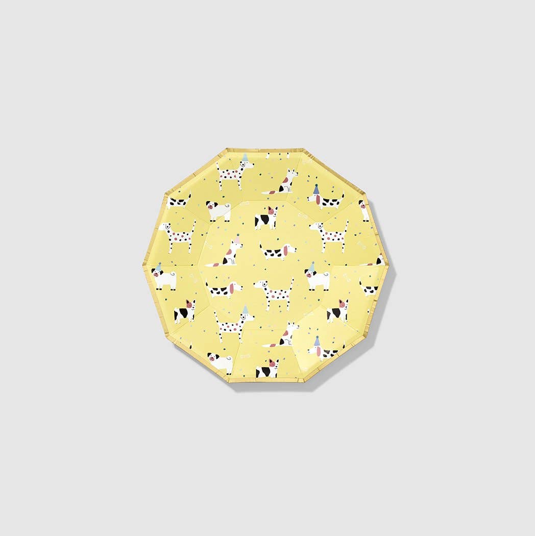 A yellow decagon-shaped paper plate with a pattern of cartoon dogs and geometric shapes.