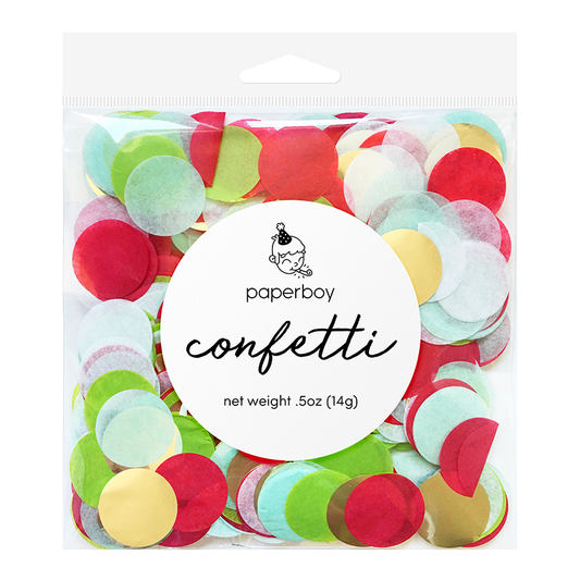 A clear bag filled with tissue paper confetti in shades of red, green, white, gold, and light blue, with a label displaying the brand 'paperboy' and the product name 'confetti'.