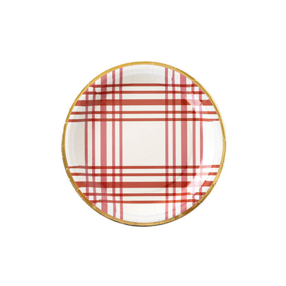 A round paper plate with red plaid stripes and gold foil accents on the edge.