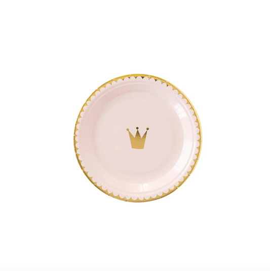 Small, round light pink princess party plate, featuring gold foil accents around the edges and a small crown in the center.