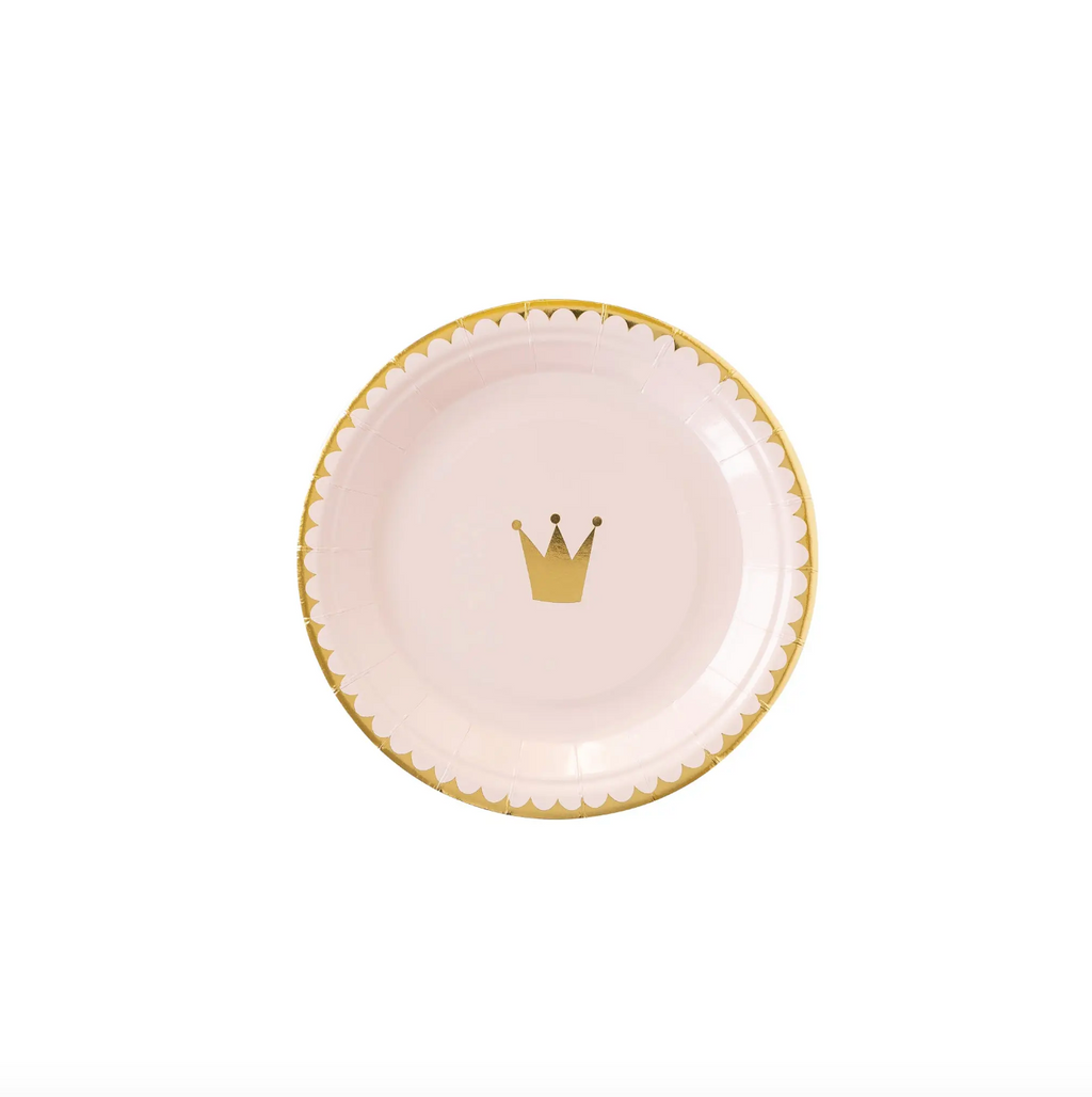 Small, round light pink princess party plate, featuring gold foil accents around the edges and a small crown in the center.