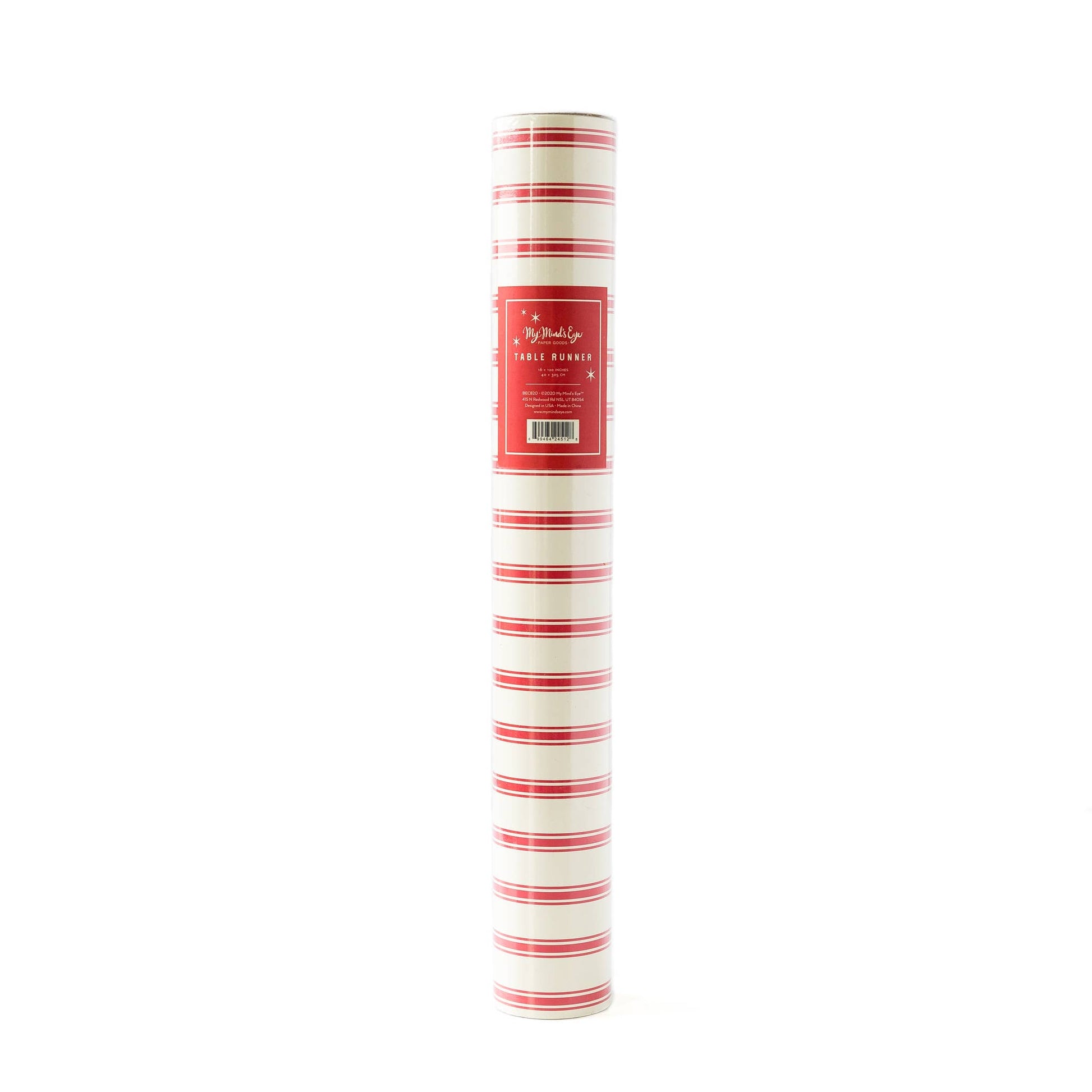 A rolled up red and white striped paper table runner with product label visible.