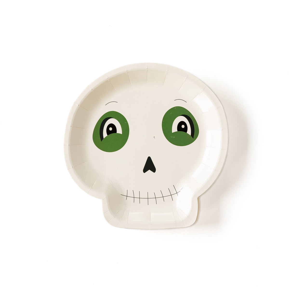 A paper plate in the shape of a skeleton with a green and white design on it, intended for Halloween use.