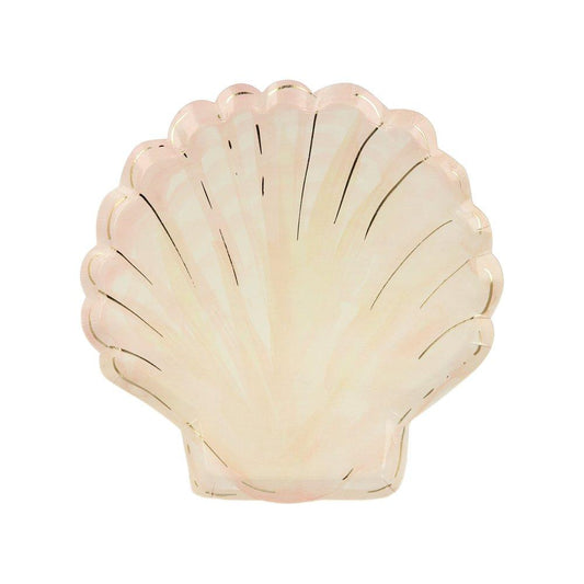 A plate designed to look like a clam shell with gold foil details.